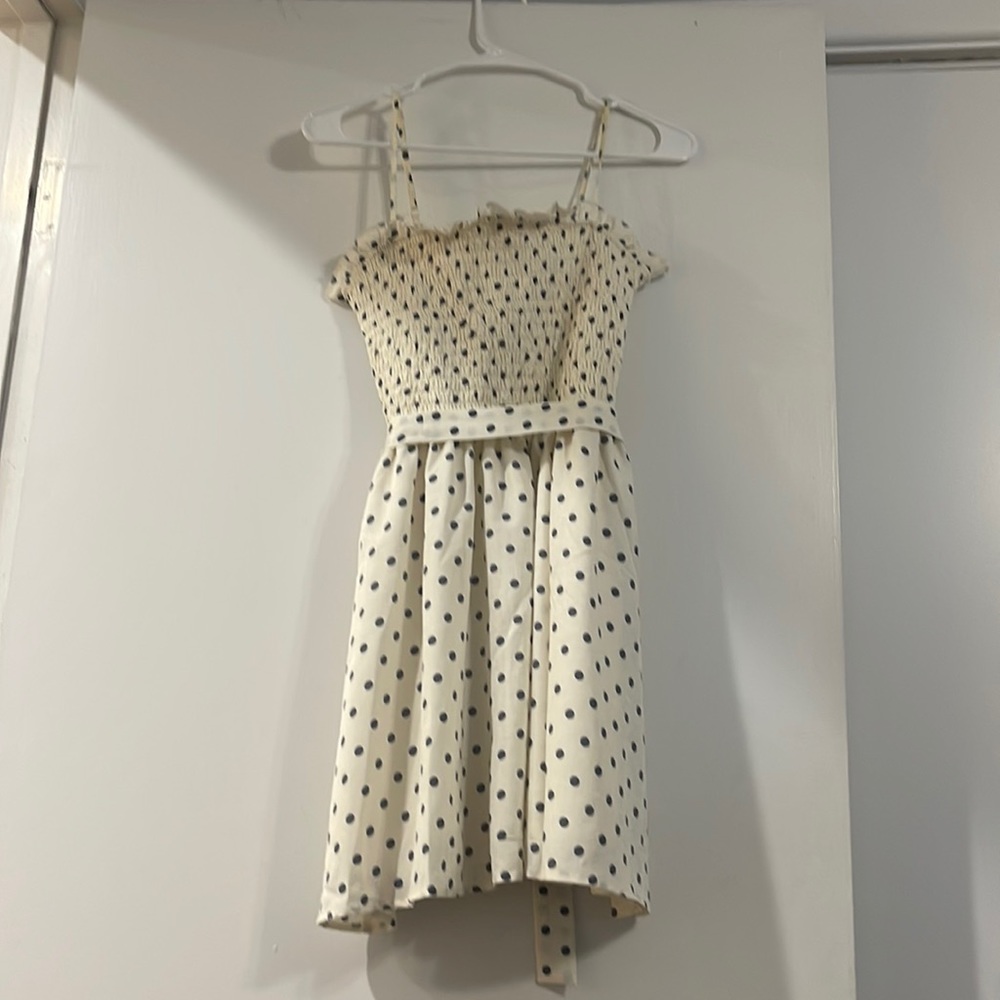 cream and navy polka dot dress with tie